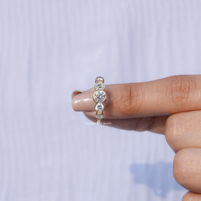 In finger front View of Pentagon And Round Lab Grown Diamond Ring In Yellow Gold