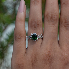Oval Cut Gemstone Engagement Ring In finger