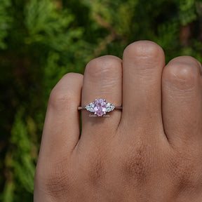 Close-Up View of Gemstone Oval Cut Engagement Ring In White Gold