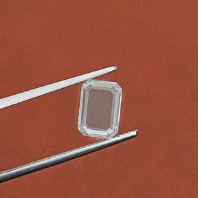 Tweezer hold In Portrait Emerald Cut Loose Diamond