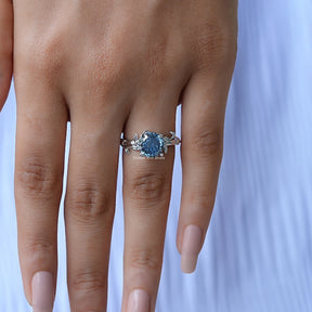 Close-Up View of Round Cut Moissanite Engagement Ring In White Gold
