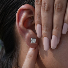 Close view of diamond stud earrings in a Unique design 
