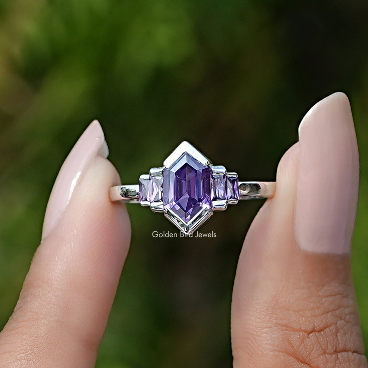 Front View of Purple Amethyst Hexagon Gemstone Bezel Ring In two Fingers