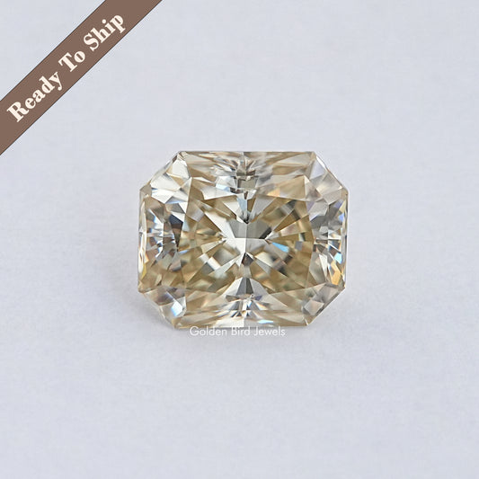Yellow radiant-cut moissanite loose stone with faceted gemstone sparkle