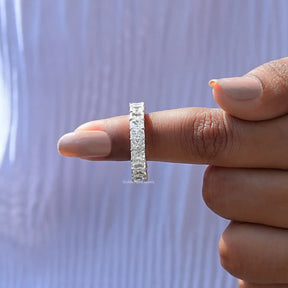 In finger front View of radiant cut diamond wedding band In White Gold