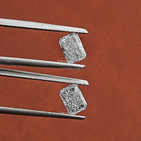 Twijer holding In Radiant Cut Loose Diamond 