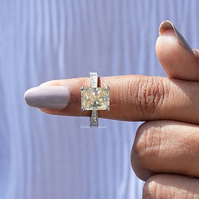 In finger front View of Moissanite Radiant Cut Accent Ring In White Gold