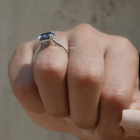 [Moissanite radiant cut hidden halo ring set in cathedral setting]