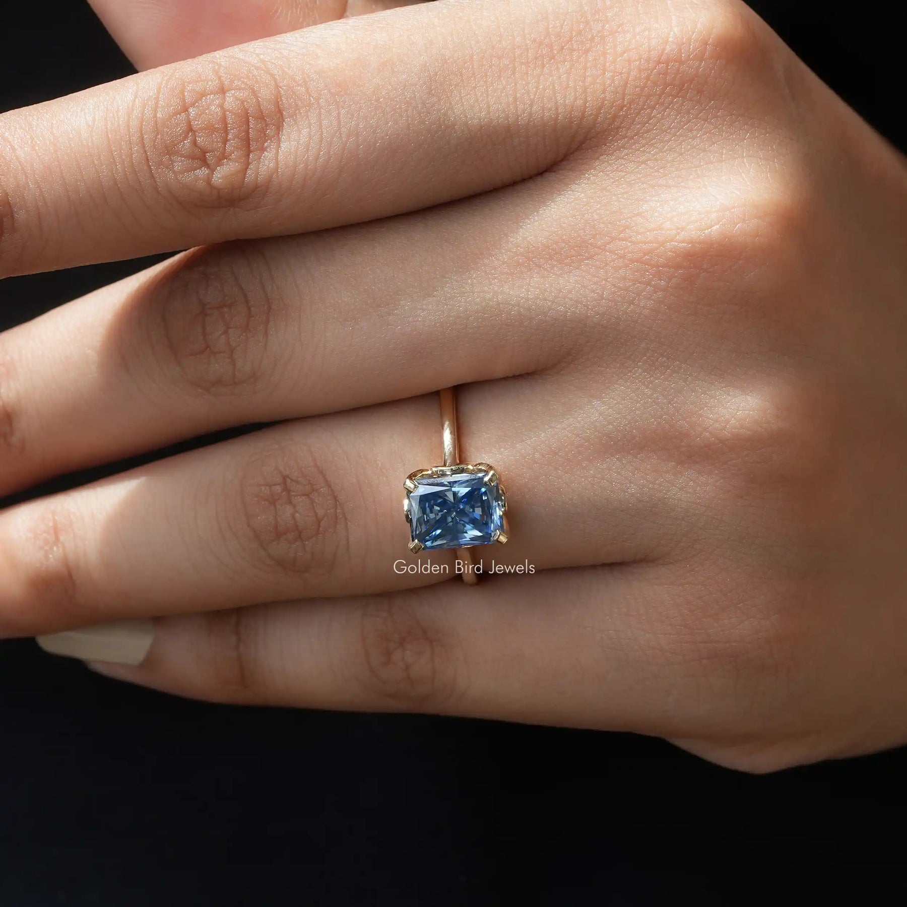 [In Finger a Moissanite Solitaire Engagement Ring]-[Golden Bird Jewels]
