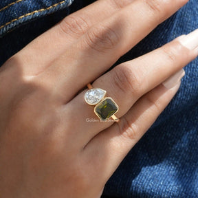 [This two stone ring made of two stones & made in 14k yellow gold]