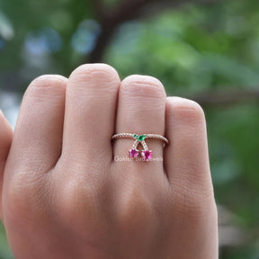 [In finger front view of green marquise and red heart cut gemstone]-[Golden Bird Jewels]