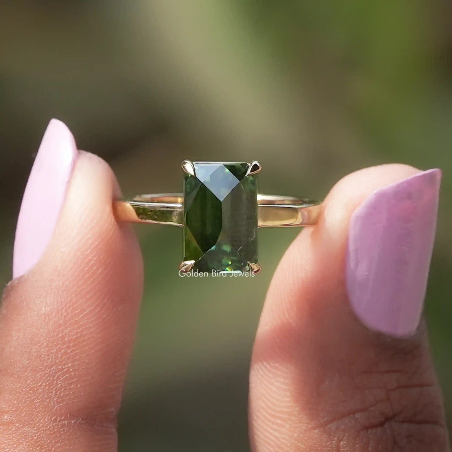 [Front view of green emerald cut solitaire ring]-[Golden Bird Jewels]
