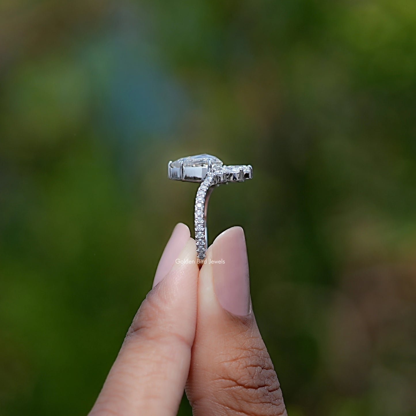 Side View of Engagement ring crafted With  Rose Cut Pear 
