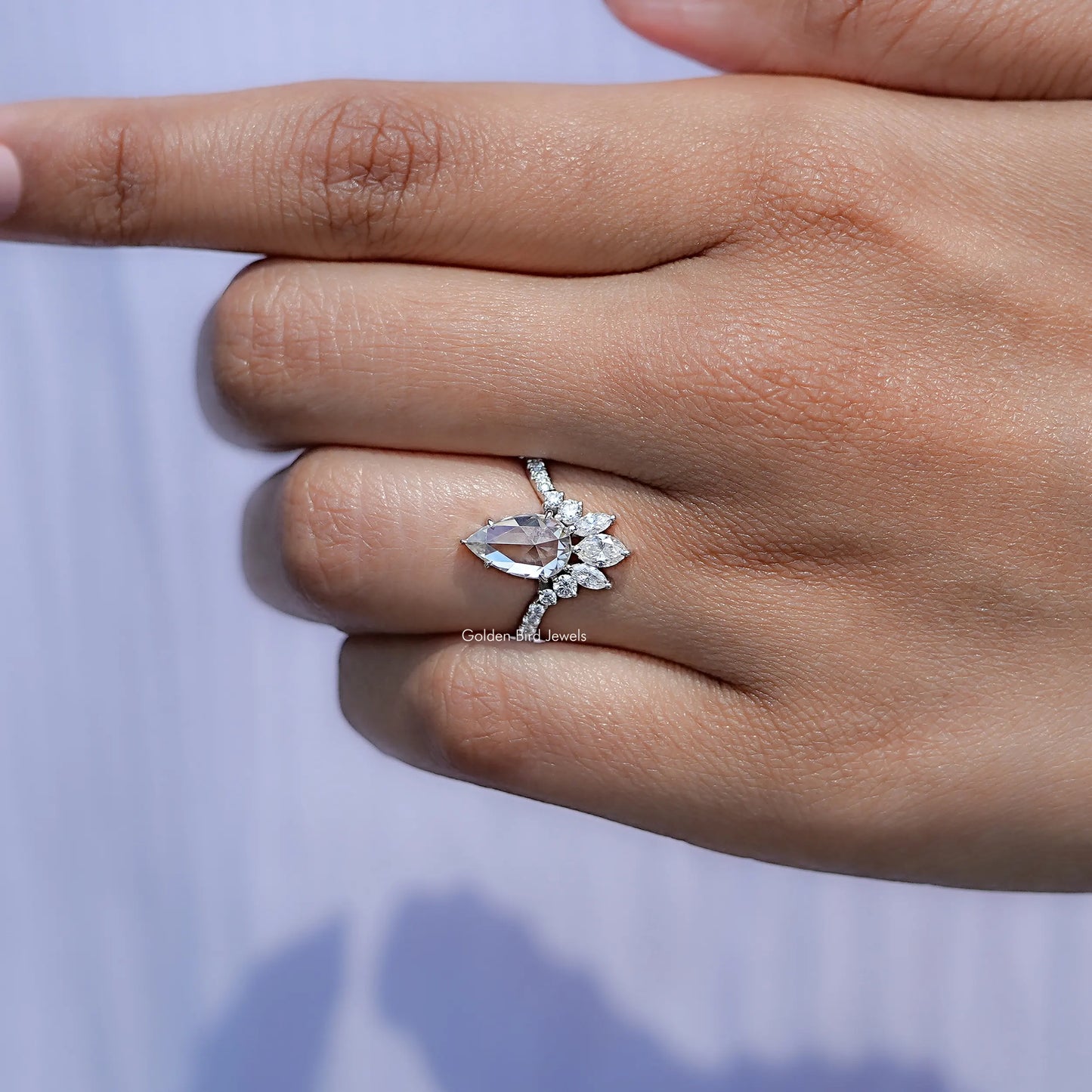 View of solitaire Rose Cut Moissanite ring in prongs setting 