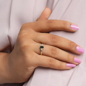 Detailed View Of Three Stone Rose Cut Oval Moissanite Ring In Yellow Gold