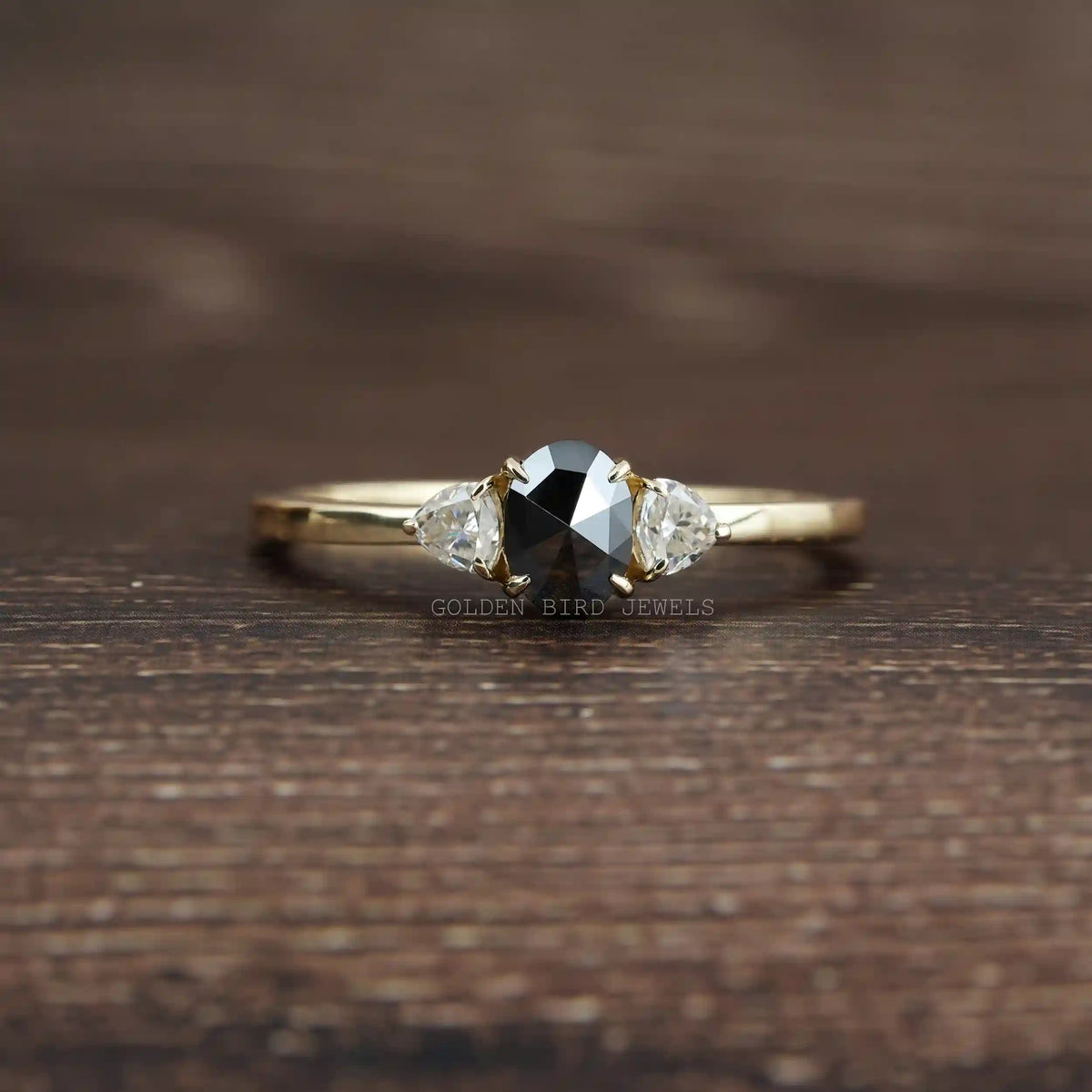 View of Rose Cut Oval And Trillion Cut Moissanite 3 Stone Ring In Yellow Gold  