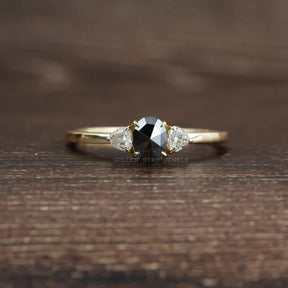View of Rose Cut Oval And Trillion Cut Moissanite 3 Stone Ring In Yellow Gold  