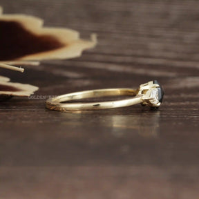 Side View of Moissanite Oval And Trillion Cut Three Stone Ring