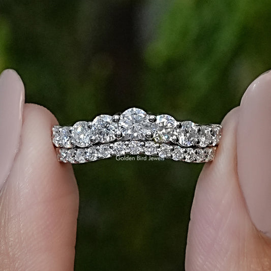 Curved double-row eternity band ring with round clear moissanite-style stones