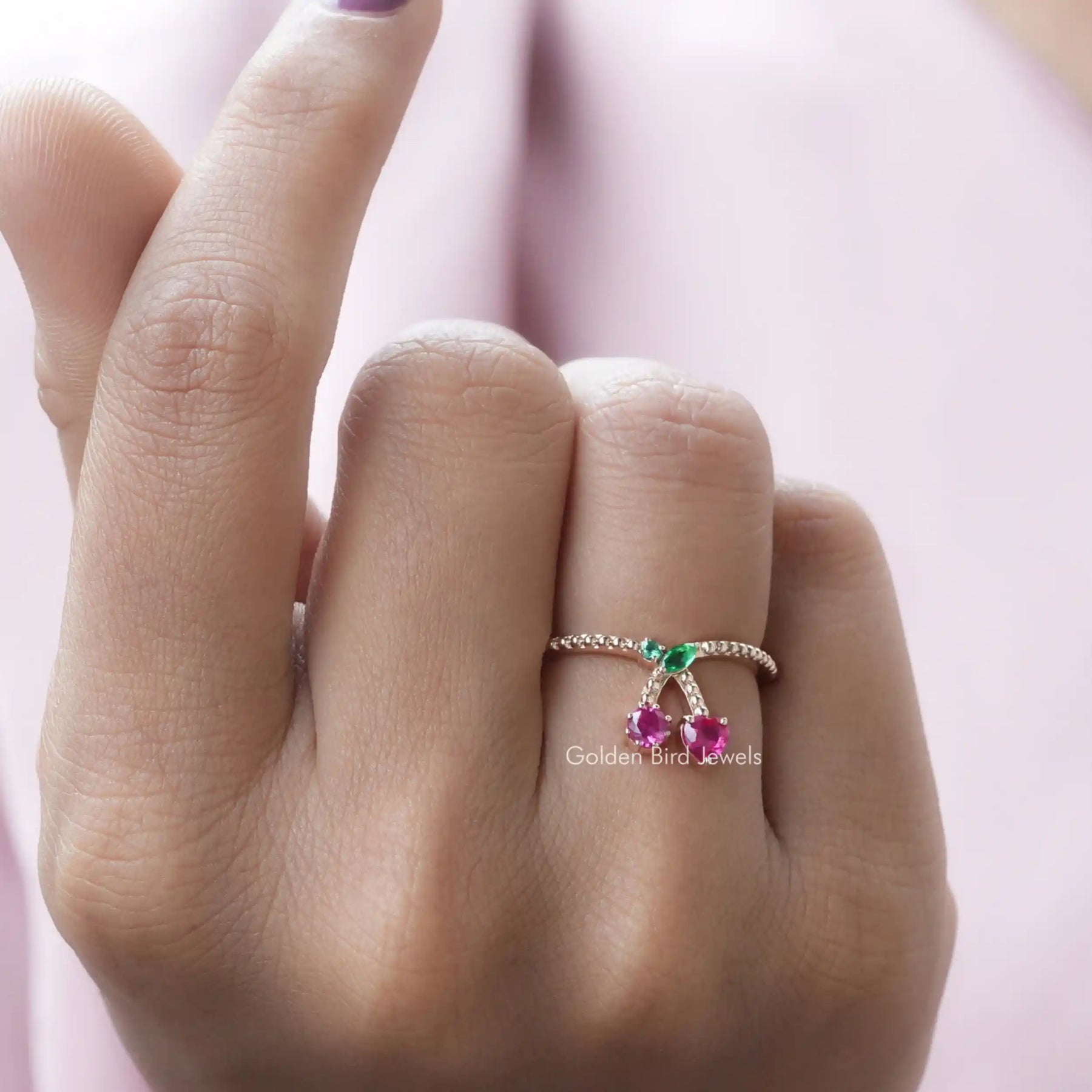 [In finger front view of round and heart cut engagement  ring made of marquise and oval stone]-[Golden Bird Jewels]