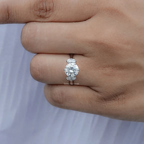 Old European Round And Oval Moissanite Three Stone Ring