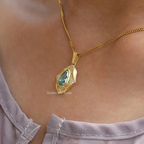 In neck front view of pear moissanite pendant