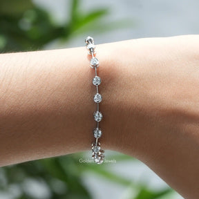 Front view of round cut moissanite bangle bracelet