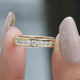 Front View of Round Cut Half Channel Set Wedding Band In two Fingers