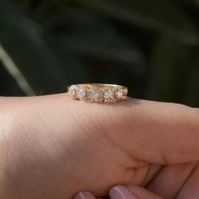 Close-Up View of Eternity Moissanite Wedding Band In Yellow Gold