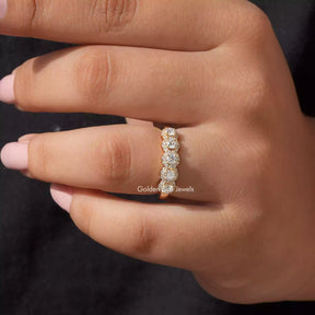 Close-Up View of Eternity Moissanite Wedding Band In Yellow Gold