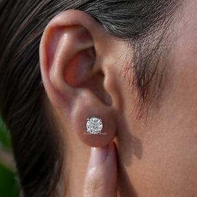 Side View of white lab diamond solitaire earings 