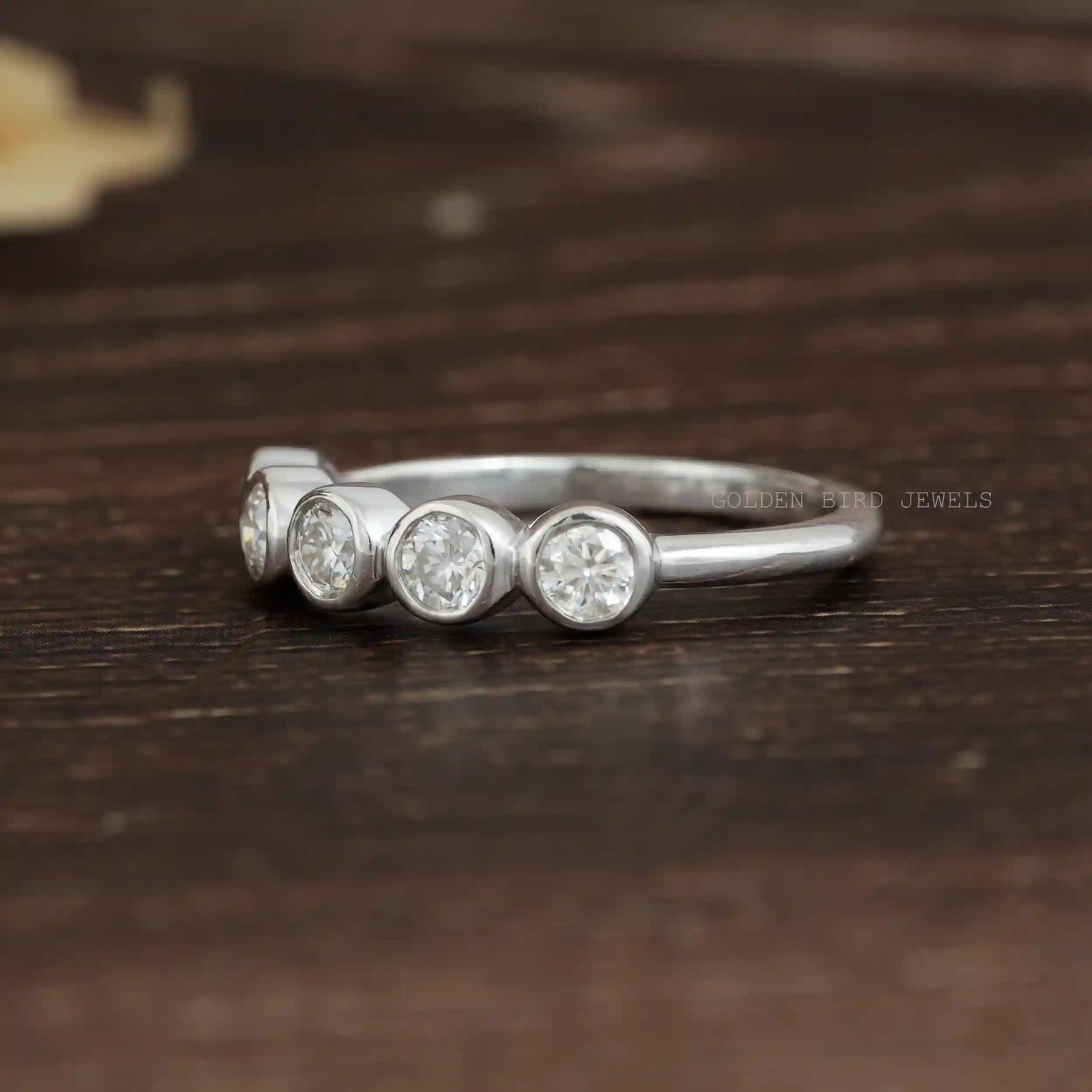 [Side view of round cut moissanite 5 stone ring in 14k white gold]-[Golden Bird Jewels]