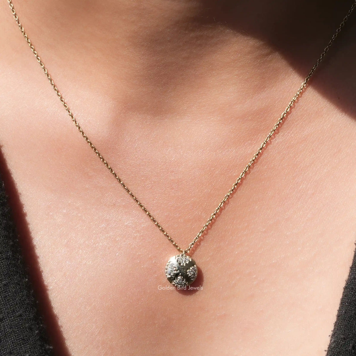 View of round cut moissanite cluster solitaire pendant 