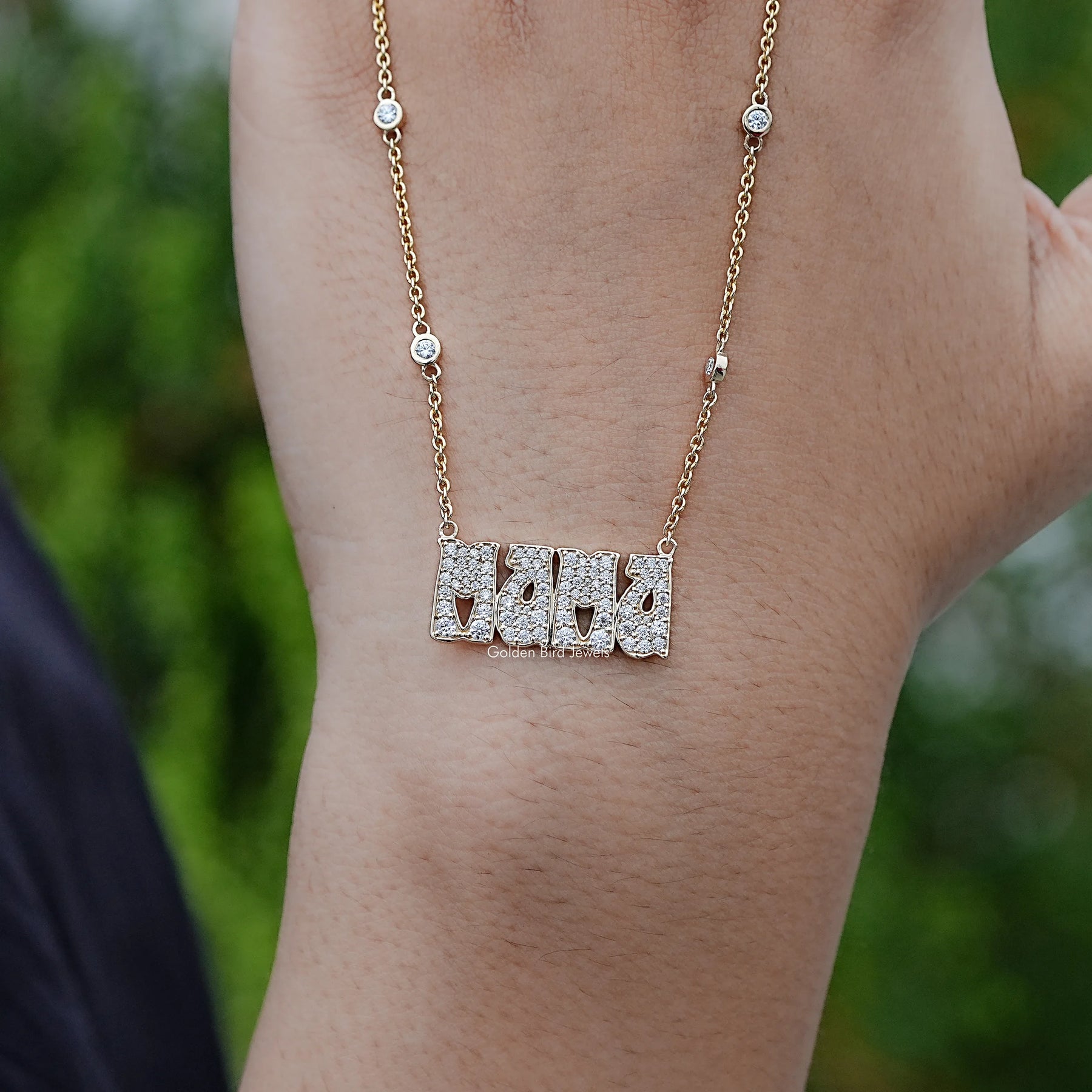 Close-Up of Moissanite Letter Pendant in Secure Setting