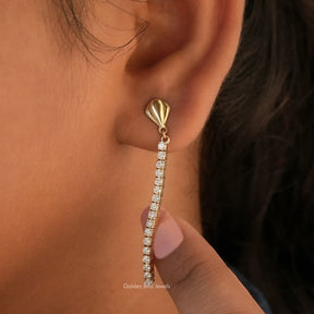 [In ear front view of round cut moissanite earrings in 14k yellow gold]-[Golden Bird Jewels]