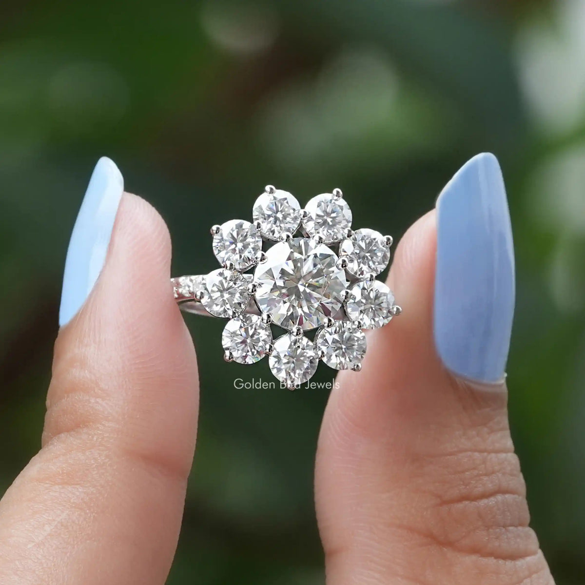 Front View of Moissanite Round Cut Floral Halo Ring In two Fingers