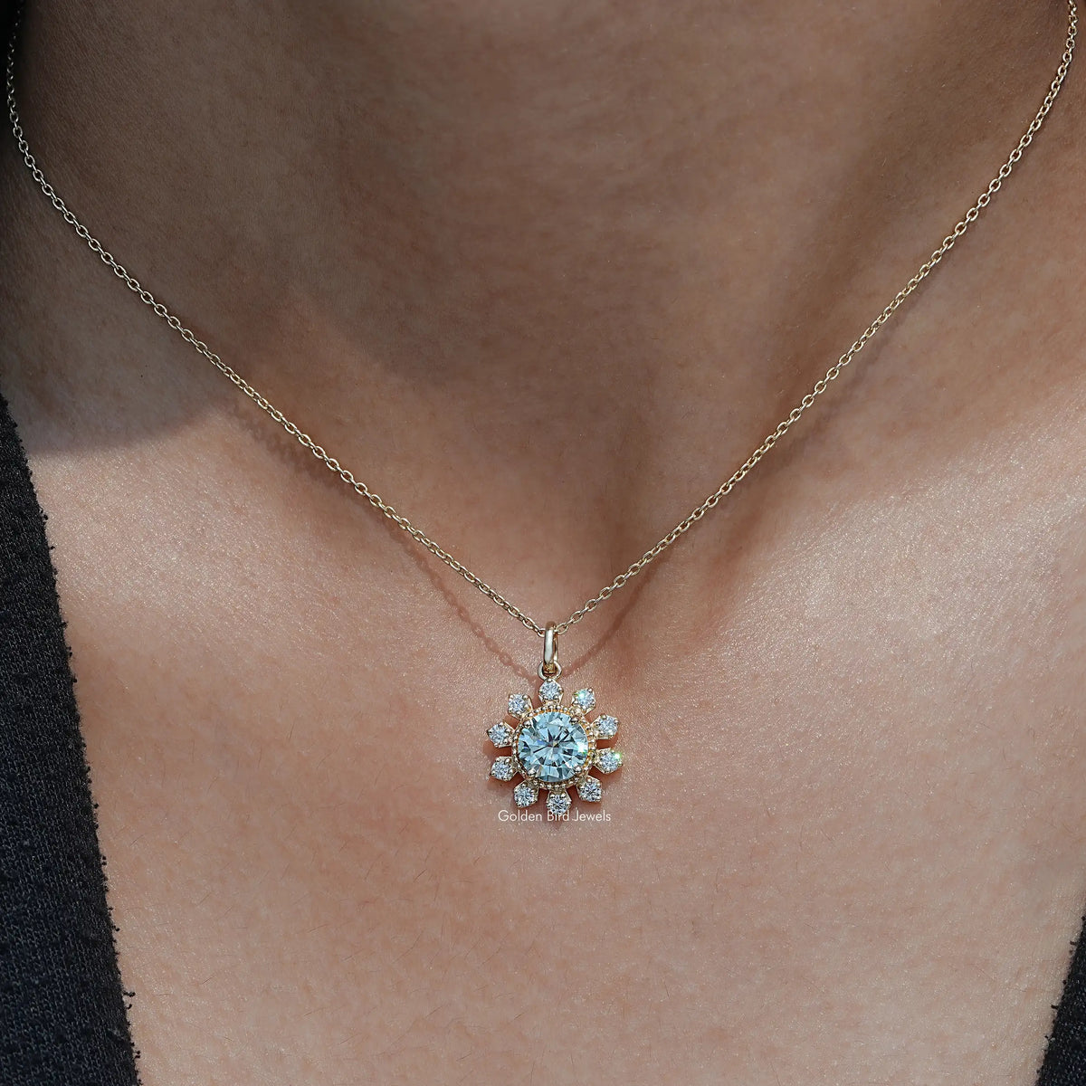 View of round cut moissanite solitaire pendant 