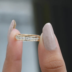 [This round cut moissanite half eternity channel set band made of yellow gold]-[Golden Bird Jewels]
