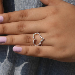 View of Round Cut Moissanite Heart Shaped Engagement Ring In Finger