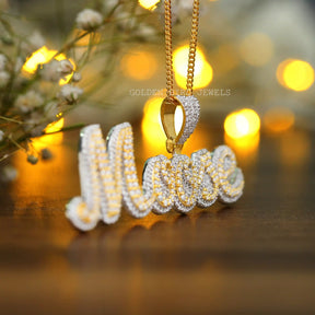 Side view of round cut moissanite pendant 