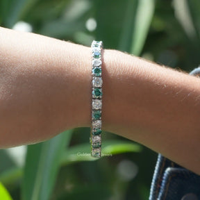 [On hand side view of round cut tennis bracelet for women]-[Golden Bird  Jewels]