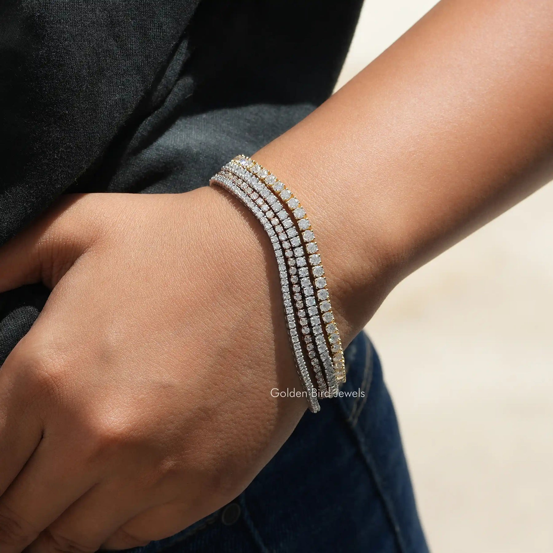 Crislu Graduated Bezel Set Round Tennis Bracelet in Platinum