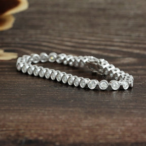 [This round cut moissanite bracelet made of round cut colorless stones]-[Golden Bird Jewels]