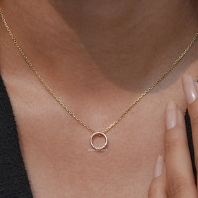 Close-Up View of Round Cut Open Circle Pendant In Yellow Gold