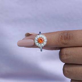 In finger front View of Round Cut Sunstone Engagement Ring In White Gold