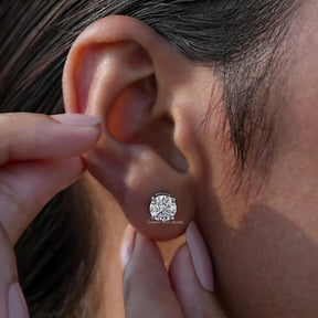 In-ear different carat weight round cut diamond stud earrings  