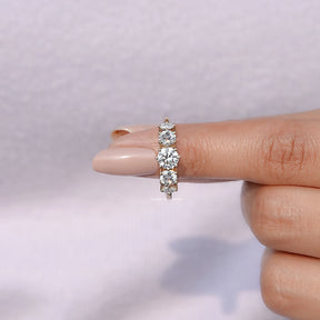 In finger front View of Round Cut Diamond Five Stone Engagement Ring In Yellow Gold