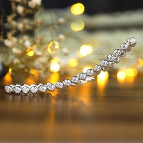 [This bezel set moissanite bracelet made of round cut stones]-[Golden Bird Jewels]