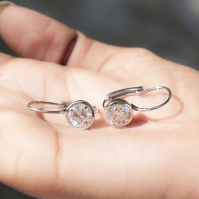 Round Moissanite Inside Out Huggies Earrings