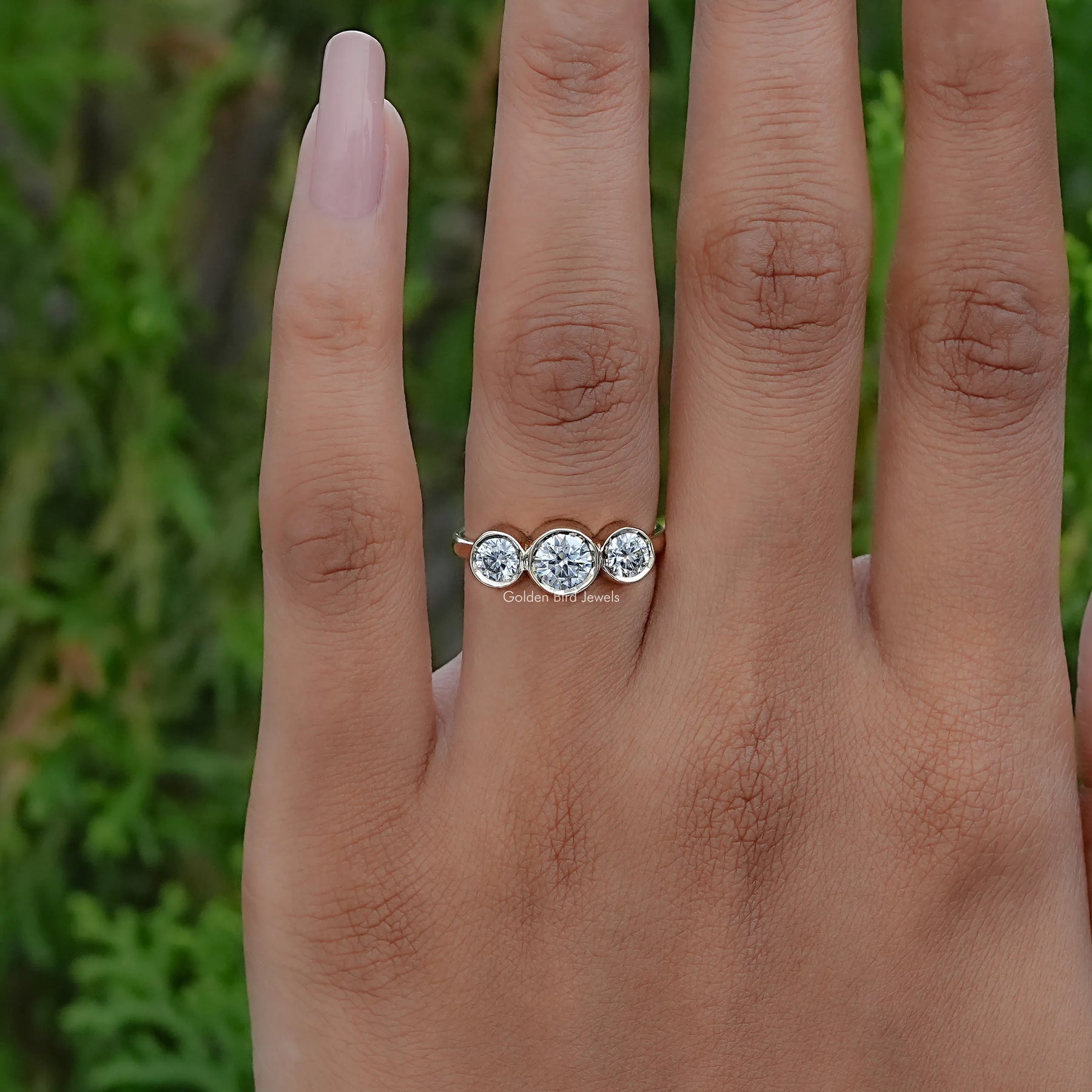 In finger view of Round Cut Solitaire Engagement Ring